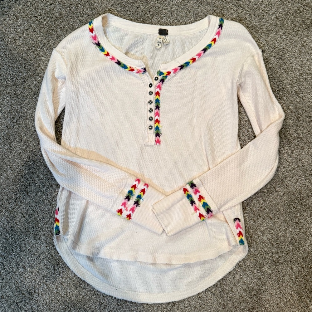 Free People Cream Henley with Colorful Trim size xs, can fit a small or medium.